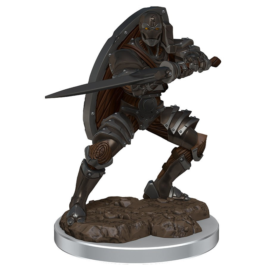 Dungeons & Dragons: Icons of the Realms: Male Warforged Fighter - Metallic armored warforged warrior with sword and shield standing on rocky base.