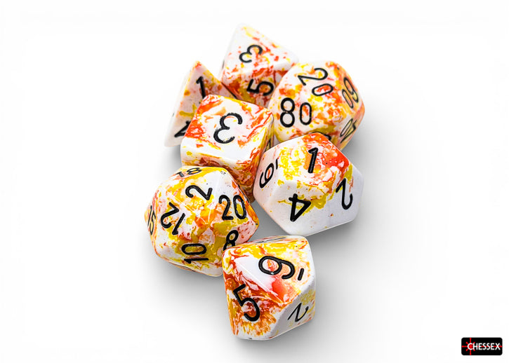 Chessex Polyhedral 7-Die Set - Sunrise/black - Seven acrylic polyhedral dice with a sunrise color blend of orange, yellow, and white, featuring black numbers.
