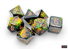 Chessex Polyhedral 7-Die Set - Forest/gold - Seven acrylic polyhedral dice set in forest green with gold numbering and mottled yellow-orange accents.