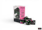 Chessex Polyhedral 7-Die Set - Paintball/green - Seven green and black acrylic polyhedral dice with pink paint splatter, displayed beside clear packaging with pink label.
