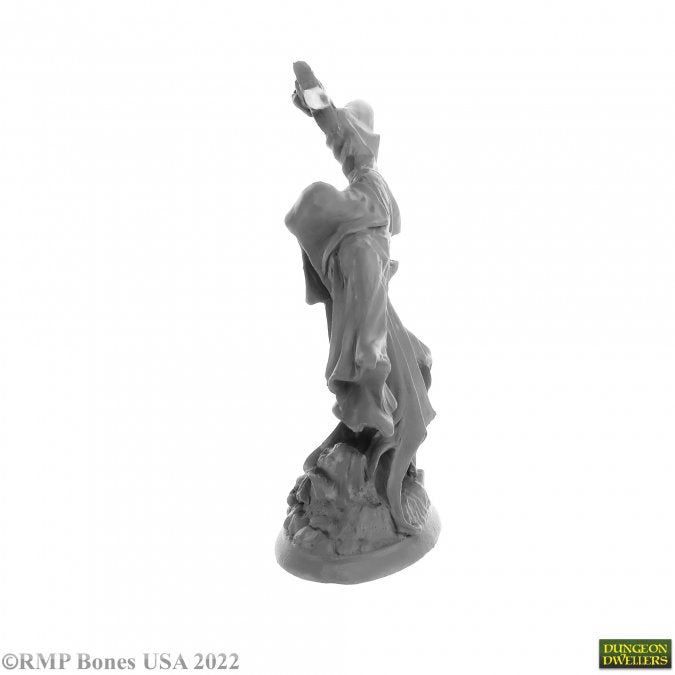 Cairn Wraith - Gray resin miniature of a ghostly figure with flowing robes and outstretched arm, standing on jagged rocks.