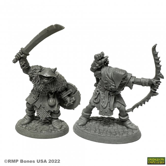 Orcs of the Ragged Wound Warriors (2) - Two unpainted fantasy orc warrior miniatures, one wielding a curved sword, the other holding a jagged bow with detailed.
