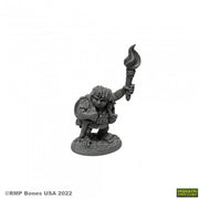 Gus Greenweevil, Halfling Henchman - Gray plastic miniature of a halfling holding a flaming torch, crouched on a textured base.