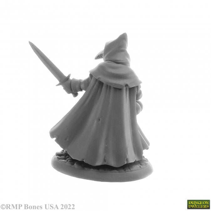 Brother Lazarus, Plague Doctor - Gray plastic miniature figurine of a cloaked plague doctor holding a sword, wearing a wide-brimmed hat and long flowing robe.