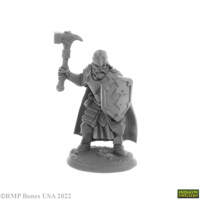 Balzador, Human Cleric - Gray unpainted miniature of armored cleric holding a war hammer and a shield with a cross emblem.