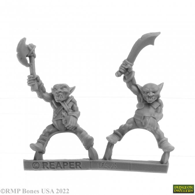 Goblin Wolfriders (2) - Two gray unpainted fantasy goblin miniatures wielding a battle axe and a curved sword, posed dynamically on a base.