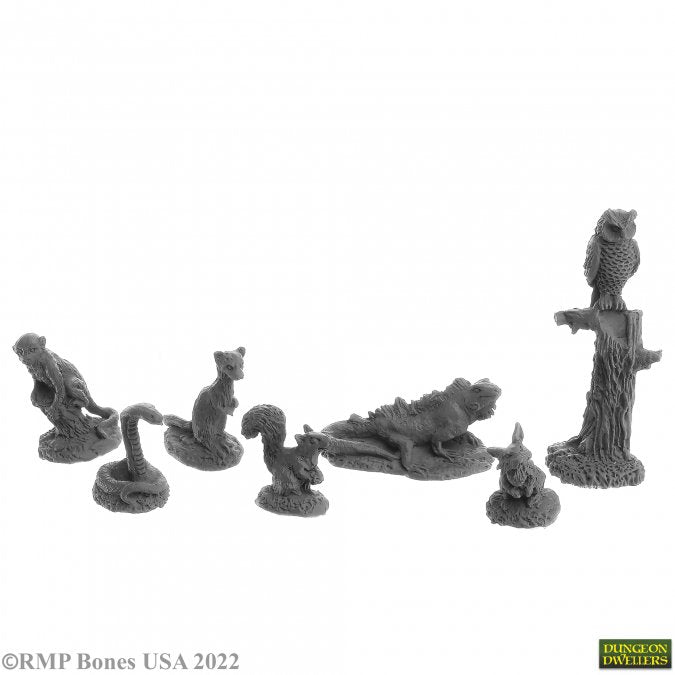 Familiars Pack #2 - Set of seven gray miniature fantasy creature figurines including owl on tree stump, lizard, squirrel, raccoon, and small.