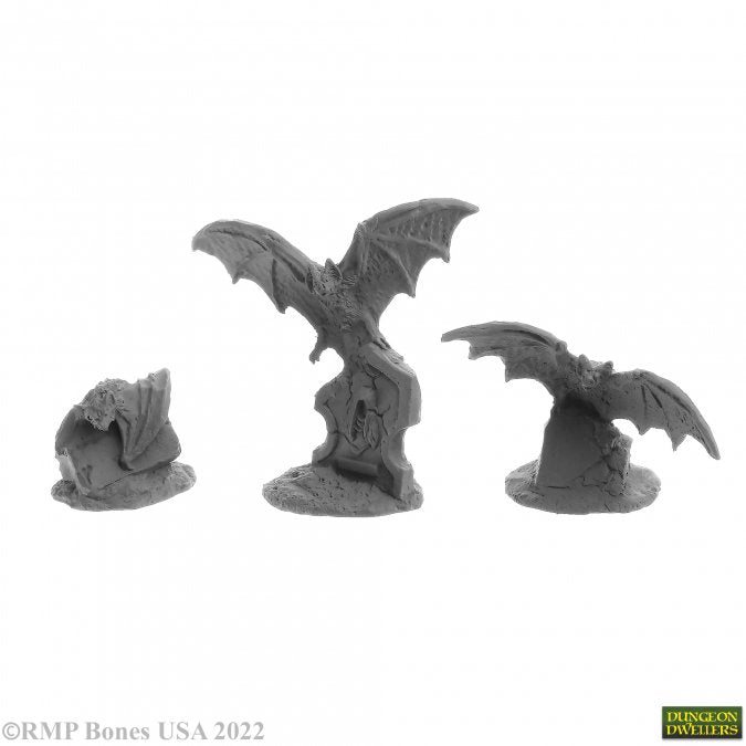 Giant Bats (3) - Three detailed gray miniature giant bats in different poses, sculpted with textured wings and bodies.