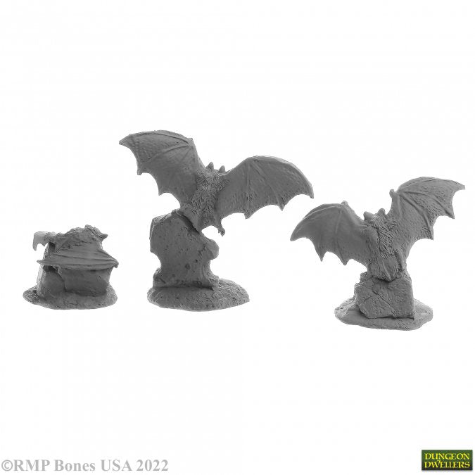 Giant Bats (3) - Set of three unpainted gray resin giant bat miniatures with detailed wings and perched on rocky bases.