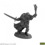 Derrell Brumby, Human Fighter - Gray miniature figurine of a hooded human warrior wielding a sword and torch on a textured base.