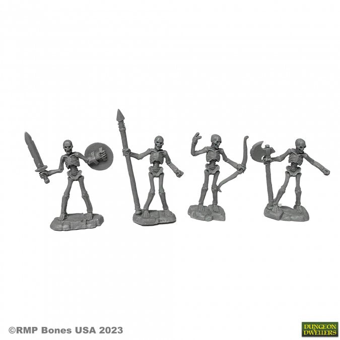 Skeleton Warriors (4) - Four gray plastic skeleton warrior figurines holding a sword, spear with shield, raised fist, and double axes.