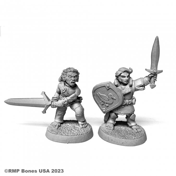 Halfling Fighter and Barbarian - Two gray plastic miniatures of halfling characters, one wielding a sword in both hands, the other holding a sword aloft and.