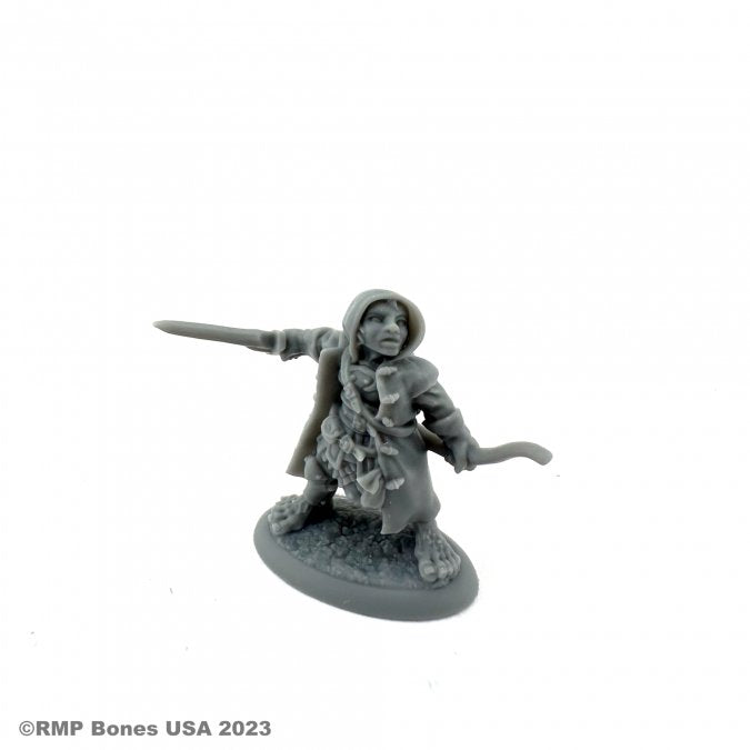 Woody Stumpwimple, Halfling Ranger - Gray plastic miniature of a halfling ranger with cloak, holding a dagger and a bow, standing on a round base.