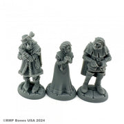 Townsfolk: Captives (3) - A man in chains and tattered clothes, a hooded woman with folded hands, and a shackled man with a cloak and headband.
