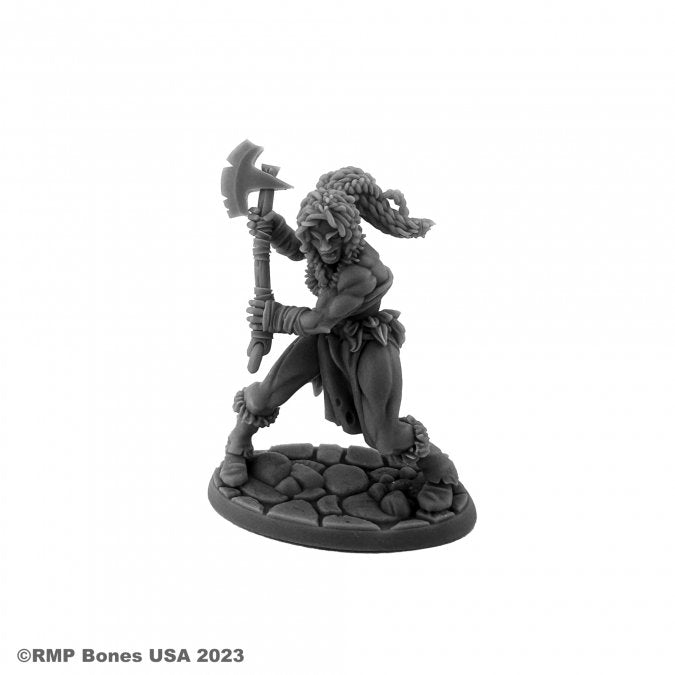 Hyborian Heroine - Black unpainted resin miniature of a female warrior holding an axe, standing on a textured stone base.