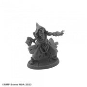 Hyborian Wizard - Gray plastic miniature of a robed wizard with pointed hood, outstretched arm, and holding a staff on a round base.