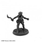 Emrul Gozgul, Half-Orc Rogue (Alternate Sculpt) - Gray plastic miniature of a half-orc rogue wielding a curved dagger and wearing detailed leather armor, posed on a round.