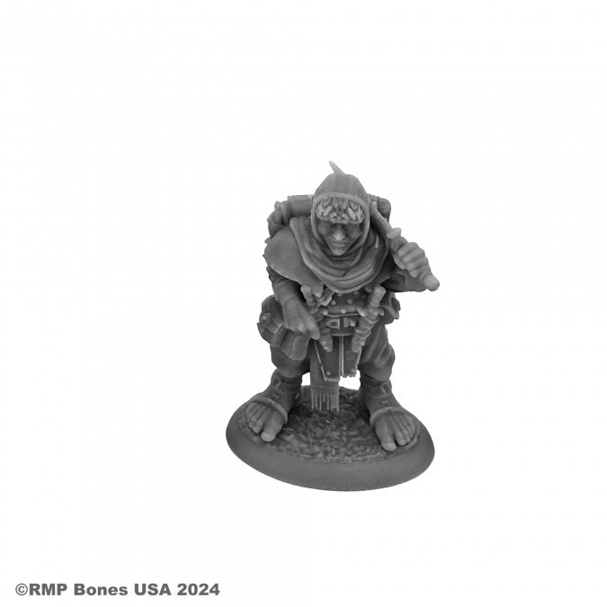 Dodger Barncock, Halfling Rogue - Gray plastic miniature figurine of a halfling rogue crouching, wearing layered armor and a hood, holding a dagger in a.