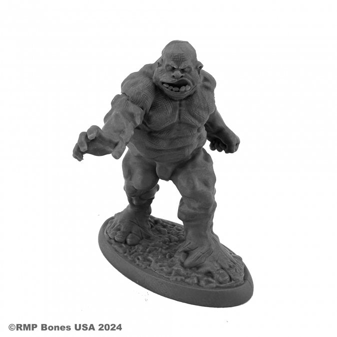 Clay Golem - Gray clay golem miniature with muscular build, large hands, and fierce expression on oval base.