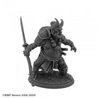 Ogre Magi - Gray plastic miniature of a muscular two-headed ogre warrior holding a staff, wearing armor and a beaded necklace.
