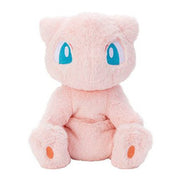 Pokemon Plush: Mew - Soft pale pink plush toy of Mew with large blue eyes and orange paw pads sitting upright.