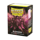 Dragon Shield Dual Sleeves 100ct Box - Matte Blossom - Black and deep pink matte card sleeve box featuring a large stylized blossom design and Dragon Shield logo.