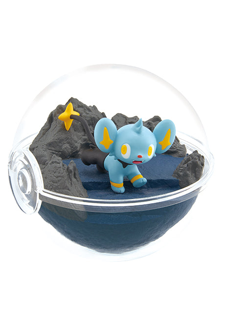 Re-Ment Pokémon Terrarium Collecion 12 Series Blind Box - Individual - Clear plastic sphere terrarium with a miniature blue and yellow Pokémon figure and gray rocky landscape inside.