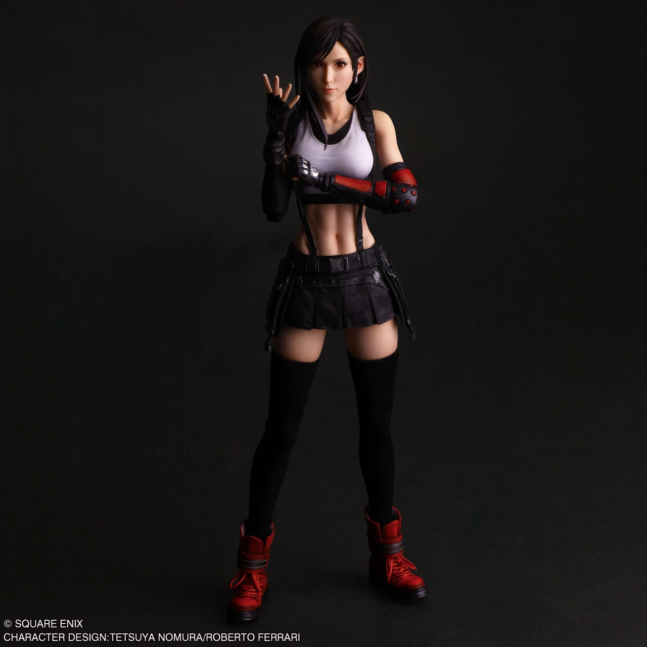 Play Arts Shin Action Figure: Final Fantasy VII Rebirth - Tifa Lockhart (PREORDER) - Articulated Tifa Lockhart action figure in black shorts, white cropped tank, red gloves, and red boots with detailed.