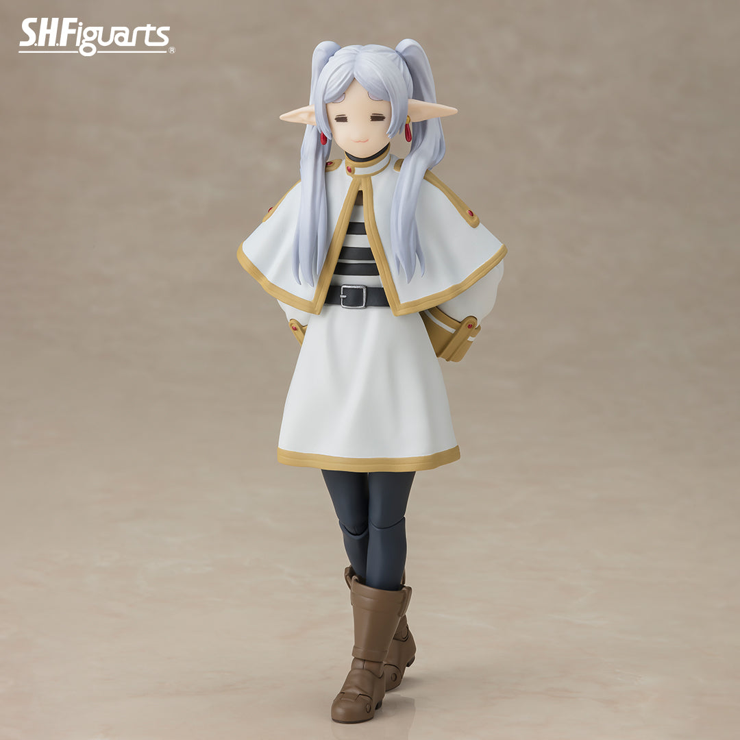 Frieren: Beyond Journey's End Figure (PREORDER) - White-haired elf figure wearing a white cloak with gold trim, black tunic, and brown boots.
