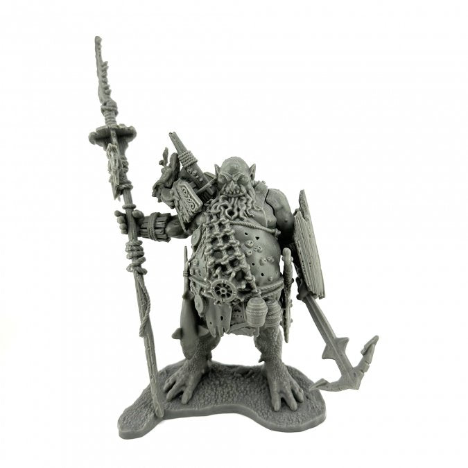 Sea Giant - Gray plastic miniature of a heavily armored giant wielding a tall spear and anchor-shaped weapon with a circular vented.