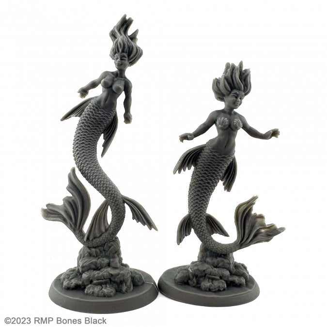 Mermaid and Siren - Two dark grey resin miniature figures of mermaids with detailed fish tails, flowing hair, and aquatic-themed bases.