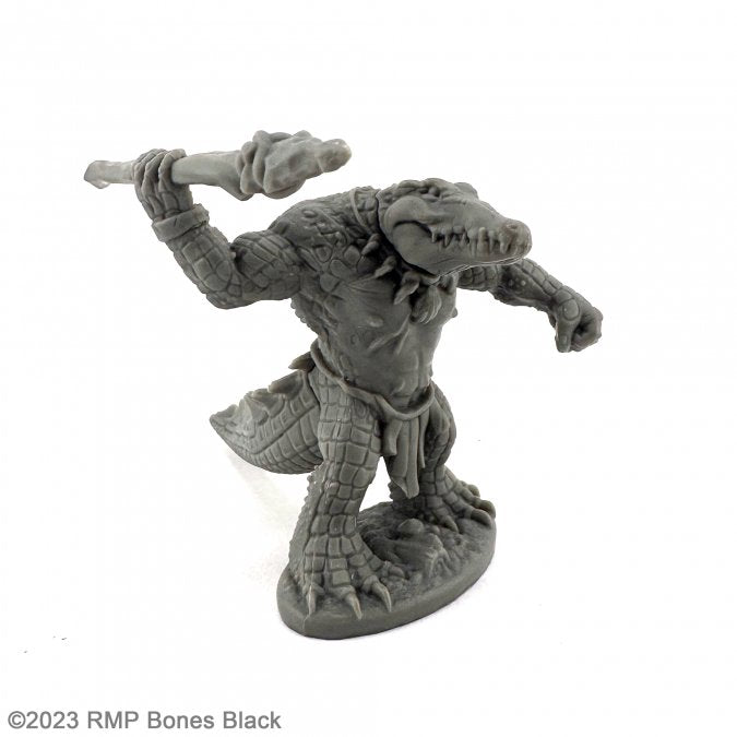 Gatorman With Spear - Gray miniature figurine of an anthropomorphic alligator warrior holding a spear, detailed scales and armor plating.