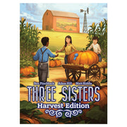 Three Sisters Harvest Edition (PREORDER) - Board game box featuring three children with a large pumpkin cart in a farm setting with a barn and windmill in the.