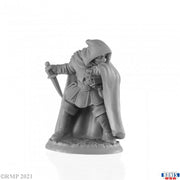 Romag Davl, Thief - Gray fantasy miniature figure of a hooded thief with a dagger and flowing cloak standing on a textured base.