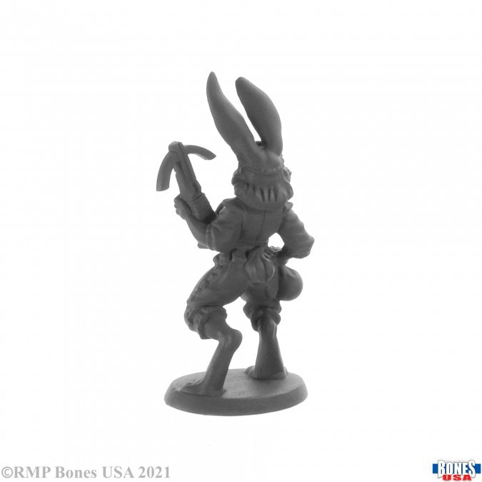 Enrieth, Female Harefolk Rogue - Gray unpainted miniature of a female harefolk rogue with tall ears, crouched pose, and holding a dagger.