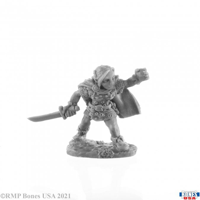 Ingrid, Female Gnome Rogue - Female gnome rogue miniature with short hair, holding a curved sword and wearing layered armor and a flowing cape.