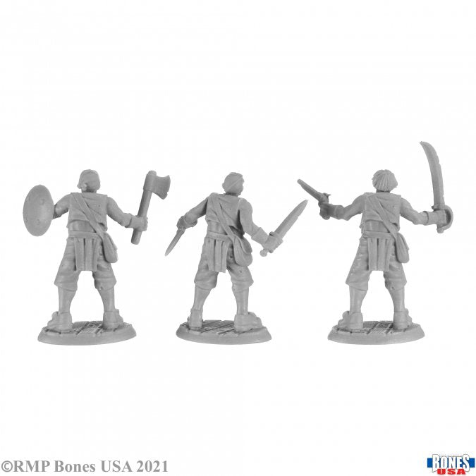Build-a-Figure Modular Pirate (3) - Three gray plastic miniature pirate figures holding a shield, axe, dagger, and curved sword, each standing on textured bases.