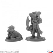 Skipper and Scuttle - Gray unpainted resin miniature of a pirate holding a sword with a dog sitting beside him.