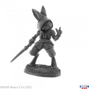 Rask, Male Harefolk - Gray resin miniature of a male harefolk wearing a hooded vest and shorts, holding a sword, standing on textured base.