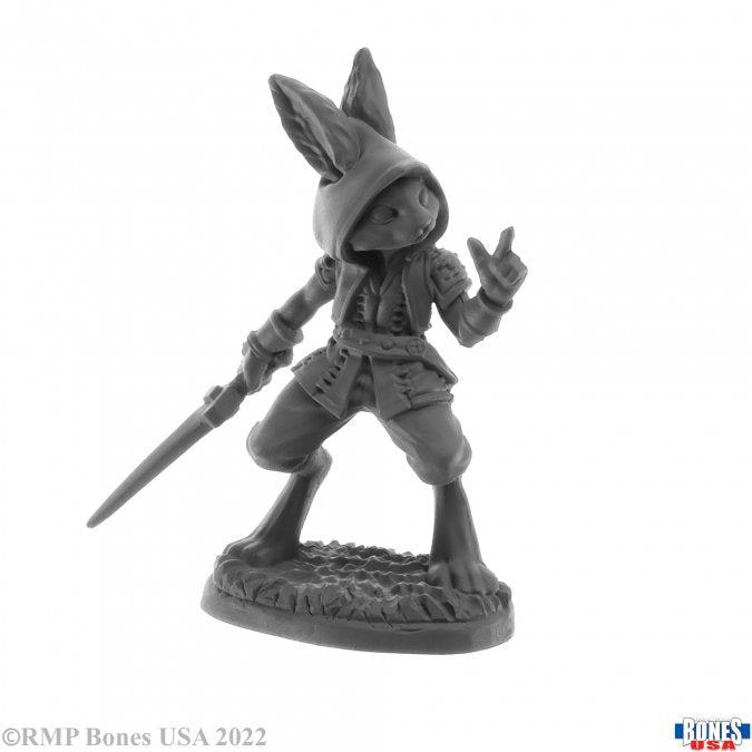 Rask, Male Harefolk - Gray resin miniature of a male harefolk wearing a hooded vest and shorts, holding a sword, standing on textured base.