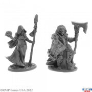 Jade Fire Leaders - Two detailed gray fantasy warrior miniatures, one hooded figure with staff and skull, and one armored figure wielding large.