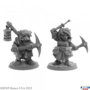 Deep Gnome Heroes (2) - Two detailed gray miniature deep gnome fantasy heroes, one wielding a pickaxe and lantern, the other raising a sword and.