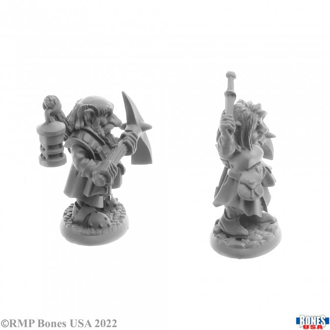 Deep Gnome Heroes (2) - Unpainted resin fantasy miniatures of two deep gnome heroes, one holding a lantern and pickaxe, the other wielding a mace.