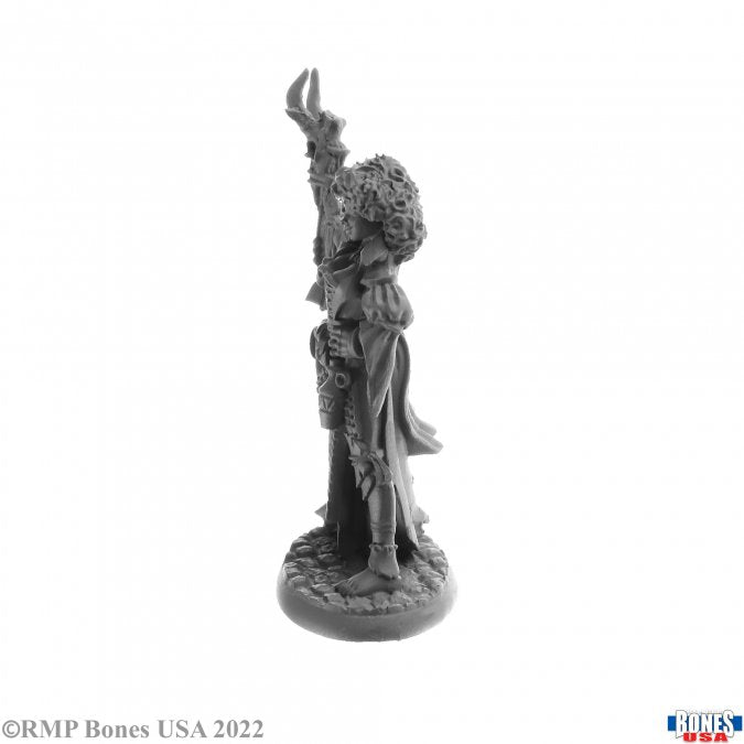 Andowyn Thrushmoor, Human Druid - Unpainted resin fantasy miniature of a human druid with raised arm and detailed robes on round base.