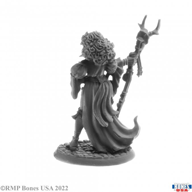 Andowyn Thrushmoor, Human Druid - Gray unpainted miniature of a cloaked human druid holding a staff topped with antlers and standing on a textured base.