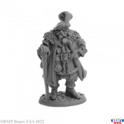 Burgermeister - Gray unpainted fantasy miniature of a bearded man in fur cloak holding a staff and shield.
