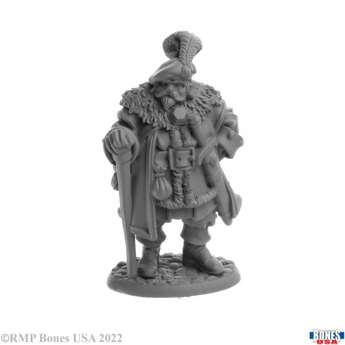 Burgermeister - Gray unpainted fantasy miniature of a bearded man in fur cloak holding a staff and shield.