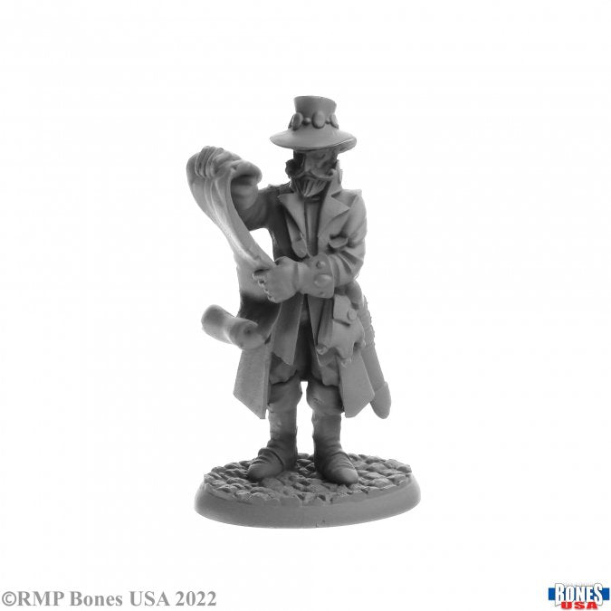 Sheriff Getmose Drumfasser - Gray resin miniature of a fantasy sheriff wearing a long coat and top hat, holding a large scroll or document.