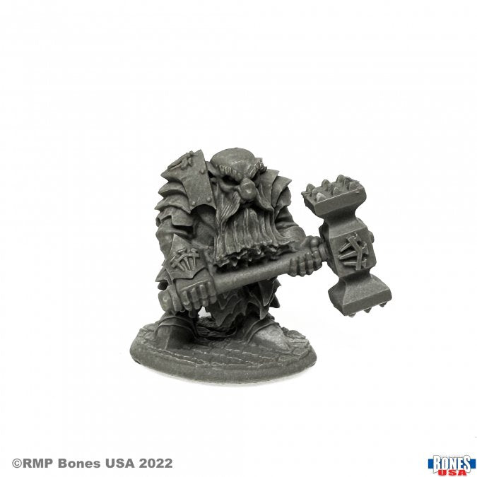 Dark Dwarf Pounder - Dark dwarf warrior figurine holding a large, spiked hammer, detailed armor and beard, standing on textured base.
