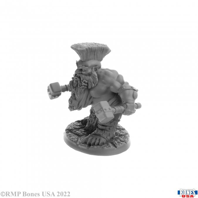 Dorn Ironspike, Dwarf Warrior - Gray resin miniature of a muscular dwarf warrior with a tall mohawk, holding a hammer in each hand.